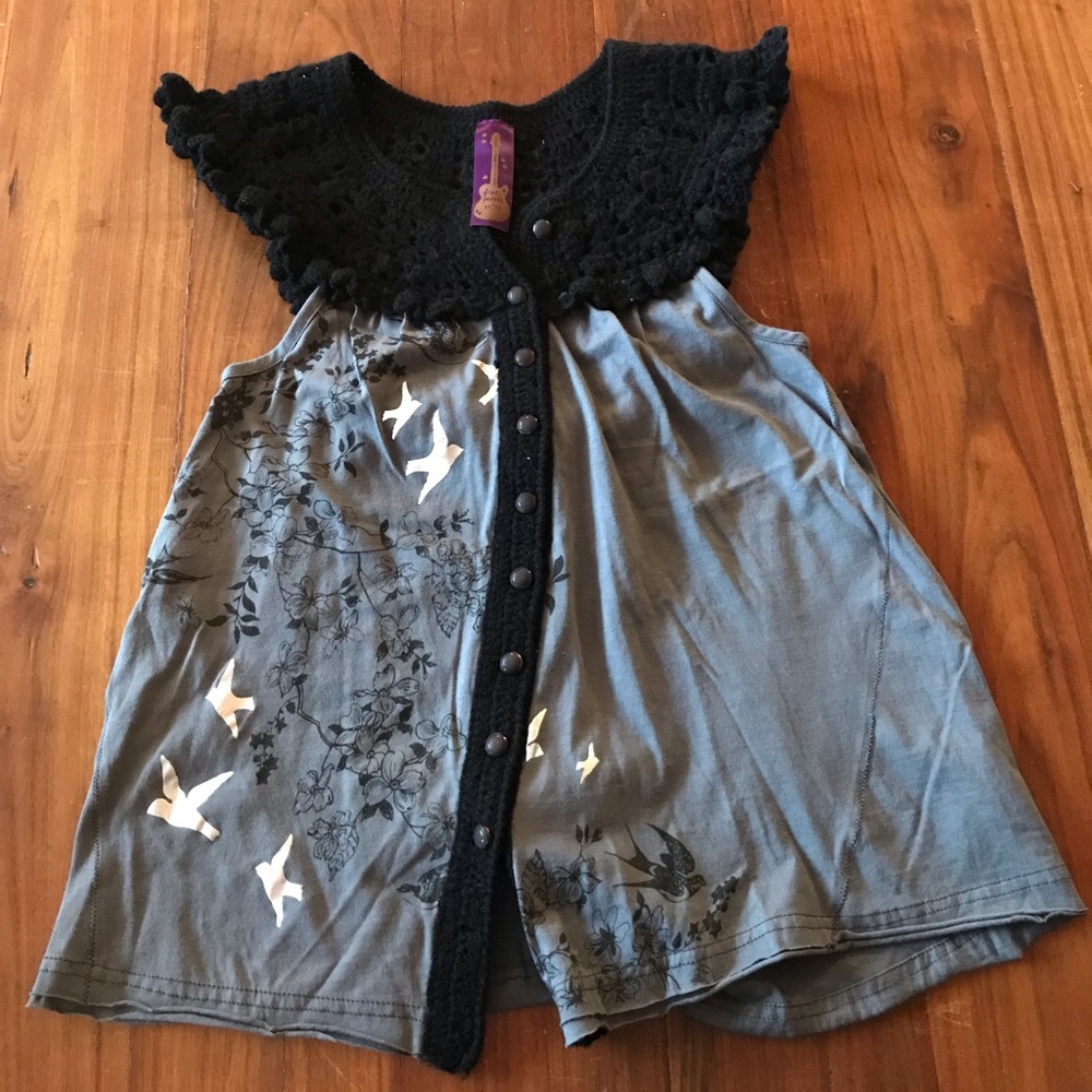 Barely worn women’s Free People Top. Size XS